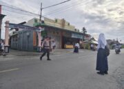 Polres Touna Gelar Strong Point Pagi untuk Kelancaran Lalu Lintas dan Keamanan Masyarakat