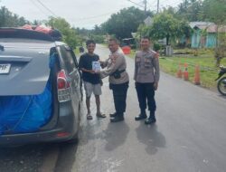 Polres Touna Sosialisasi Mudik Aman Keluarga Nyaman dan Bagikan Stiker