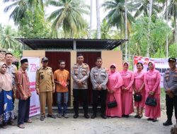 Dalam Sehari, Kapolres Touna AKBP Ridwan J.M. Hutagaol Resmikan Dua MCK di Lokasi Berbeda