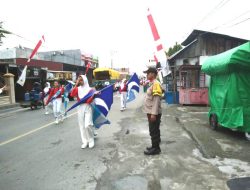 Kolaborasi Polsek dan Satlantas Polres Touna Amankan Jalan Santai Reuni SMK N 1 Ampana Kota