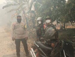 Polsek Tojo Bersama Tim Gabungan Tangani Karhutla di Tiga Desa